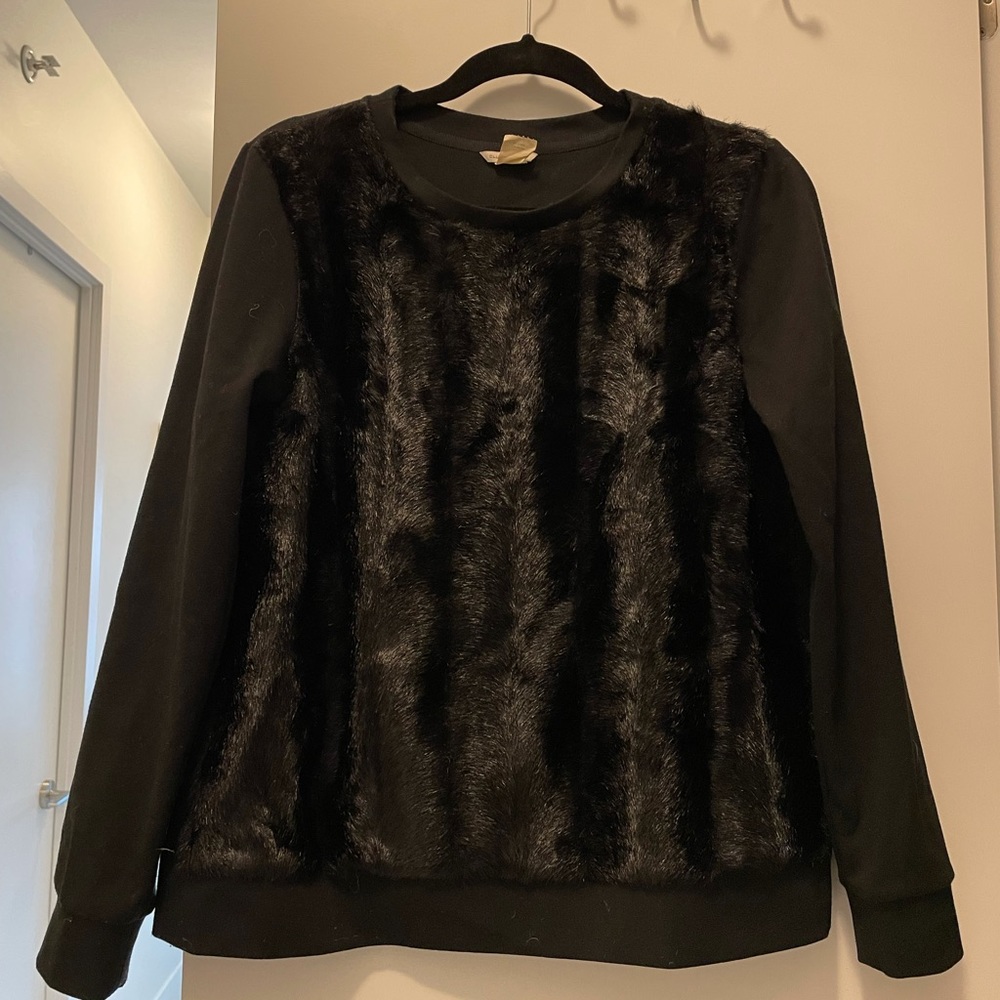 Like to ski?  Look chic on and off the slopes with this warm and fun sweater.